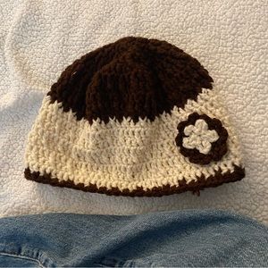 Handmade crochet knit brown and cream hat with flower